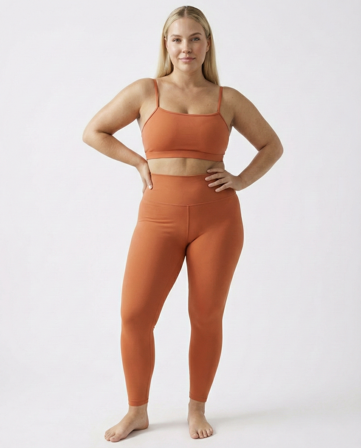 חזיית ספורט בצבע כתום ליוגה ופילאטיס