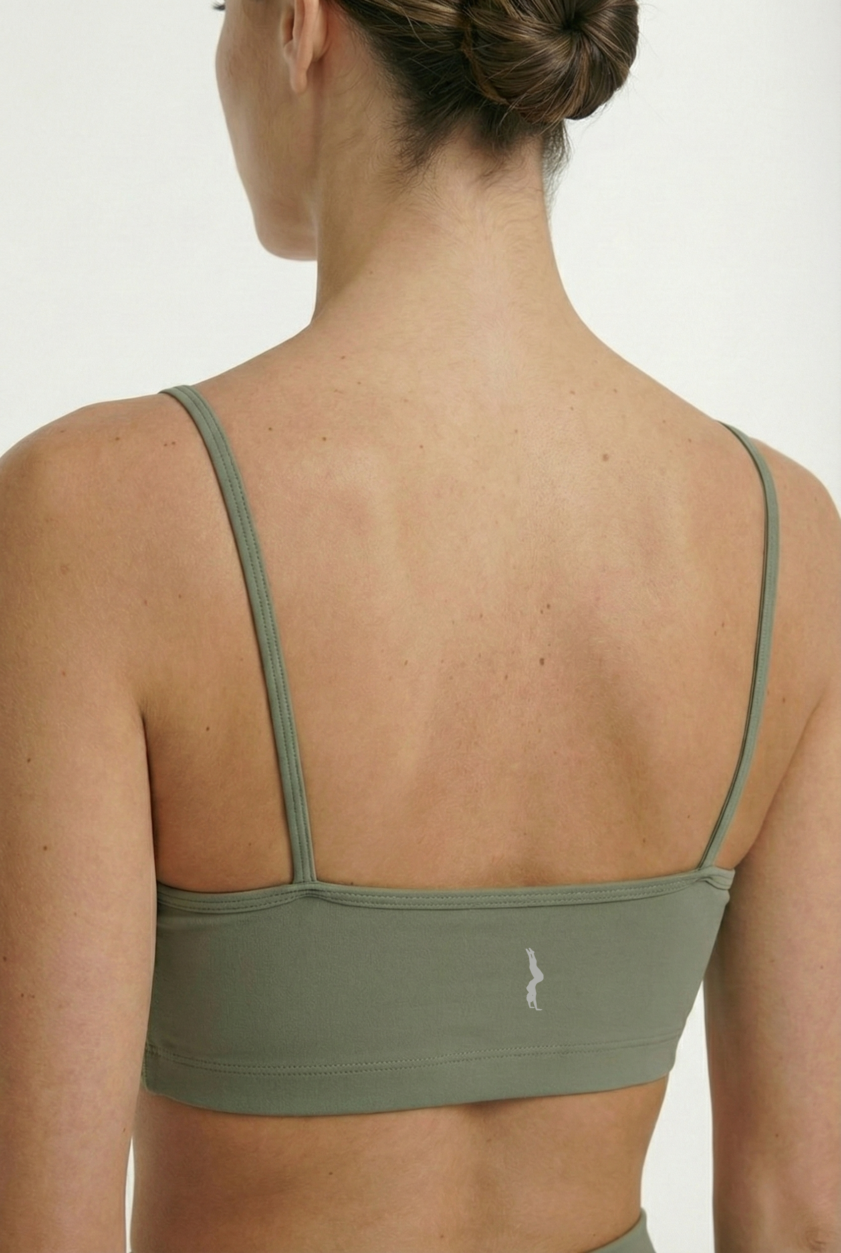 חזיית ספורט בצבע ירוק ליוגה ופילאטיס